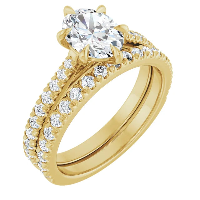 Oval Yellow Gold Claw Set Style Engagement Ring