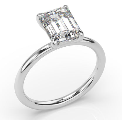 Four Claw White Gold Emerald Solitaire Engagement Ring