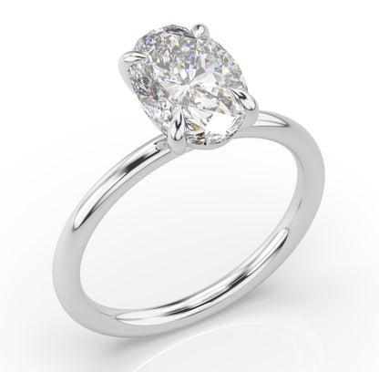 Four Claw White Gold Oval Solitaire Engagement Ring