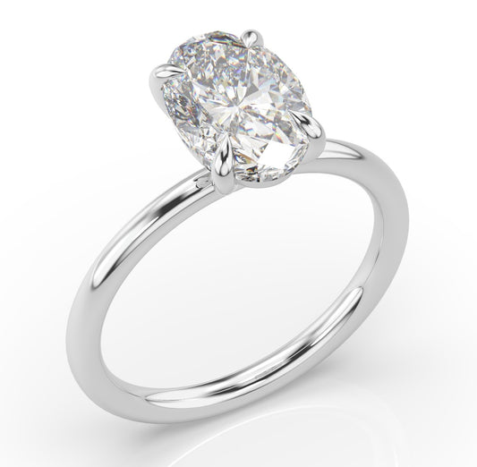 Four Claw White Gold Oval Solitaire Engagement Ring