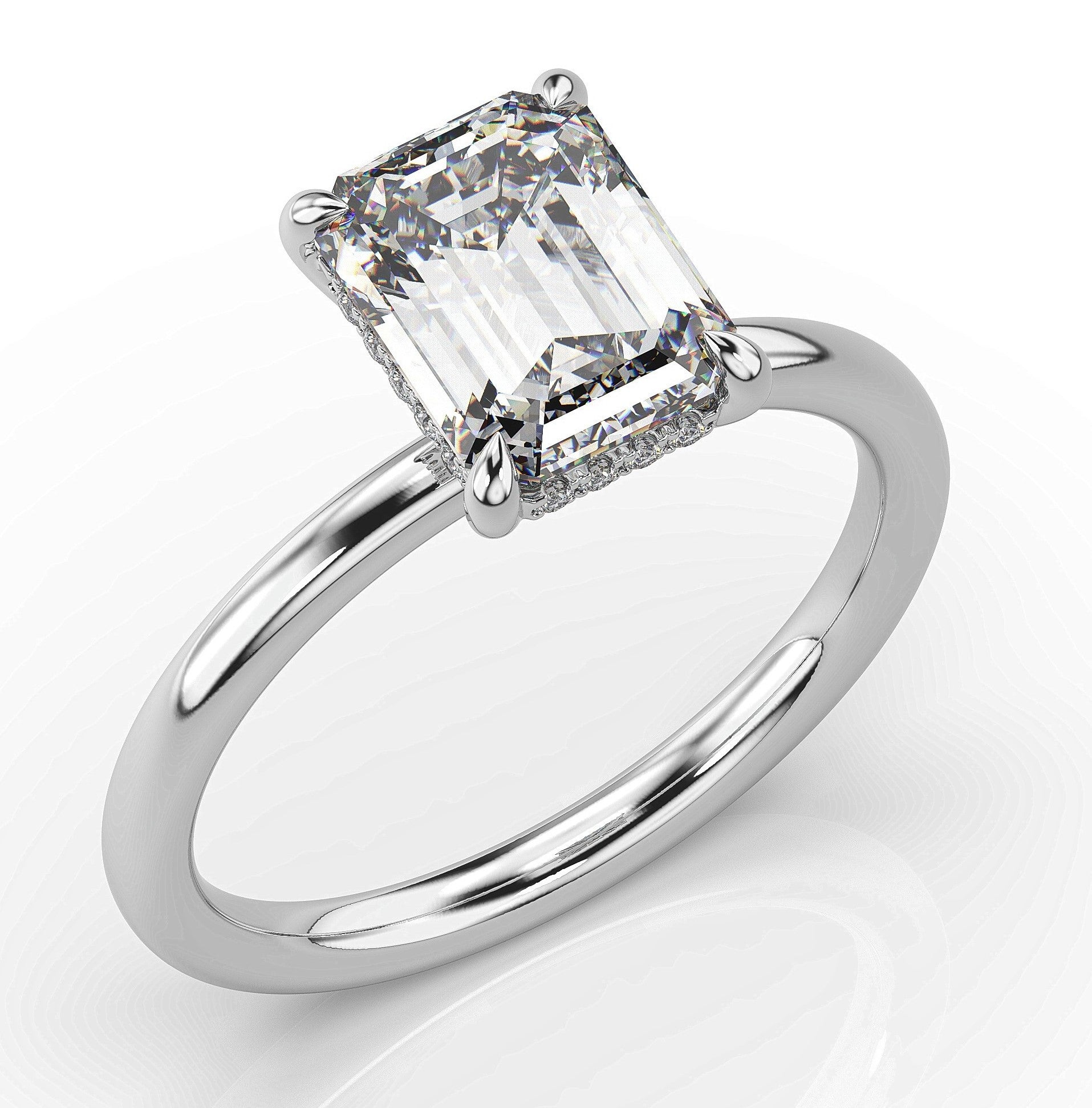 Emerald White Gold Hidden Halo Solitaire Engagement Ring