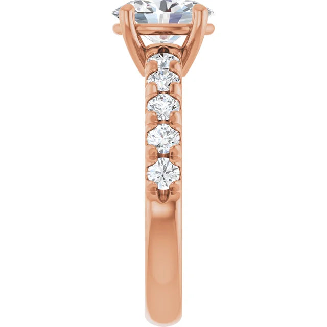 Oval Rose Gold Four Claw Set Style Engagement Ring