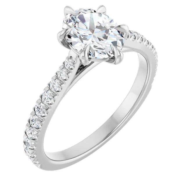 Oval White Gold Claw Set Style Engagement Ring