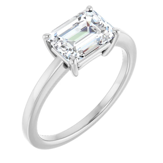 Emerald White Gold East West Solitaire Style Engagement Ring