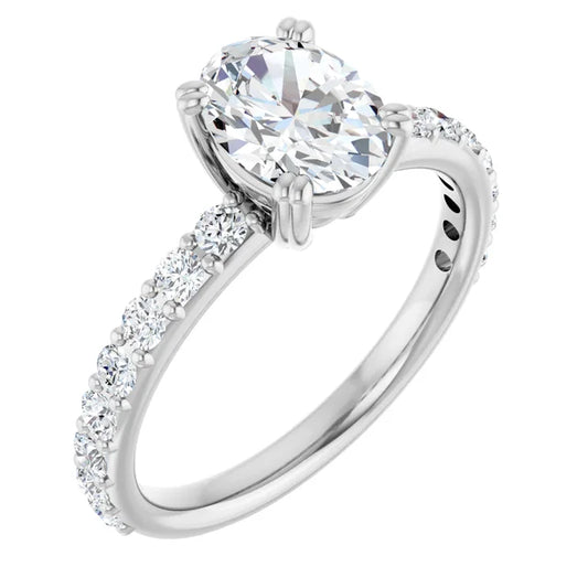 Oval White Gold Claw Set Style Engagement Ring