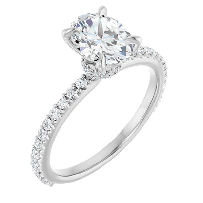 Oval White Gold Claw Set Style Engagement Ring 