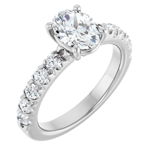 Oval White Gold Four Claw Set Style Engagement Ring