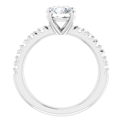 Round Brilliant White Gold Four Claw Set Style Engagement Ring
