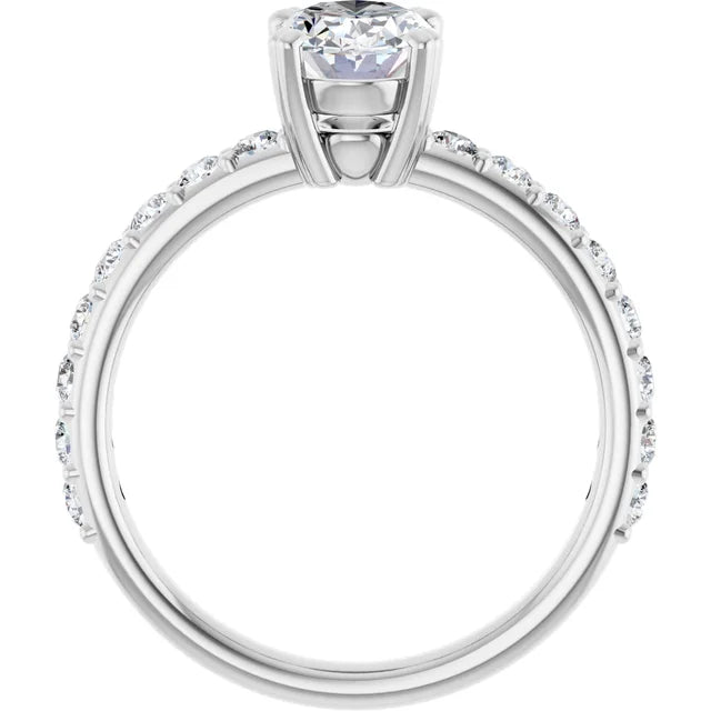 Oval White Gold Claw Set Style Engagement Ring
