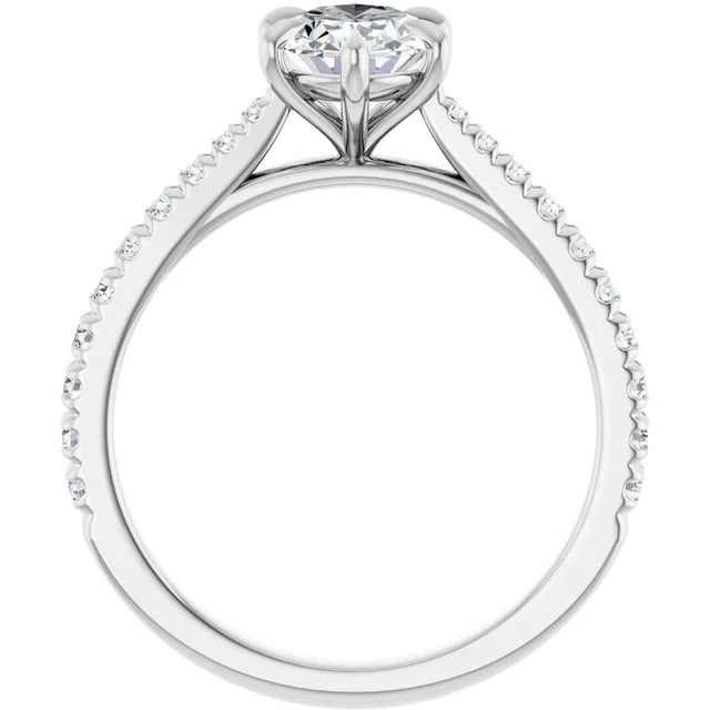 Oval White Gold Claw Set Style Engagement Ring