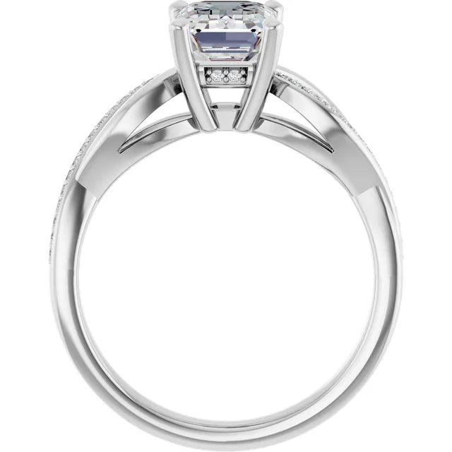 Emerald White Gold Claw Set Twist Style Engagement Ring 