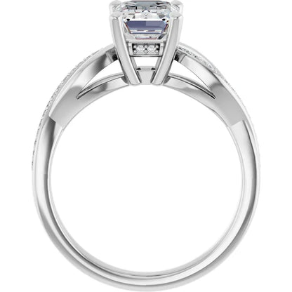 Emerald White Gold Claw Set Twist Style Engagement Ring 