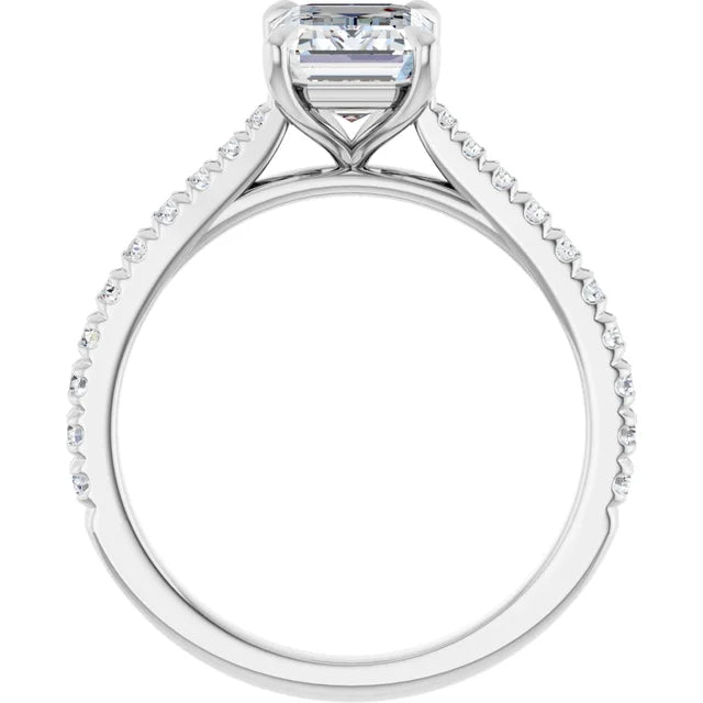 Emerald White Gold Claw Set Style Engagement Ring