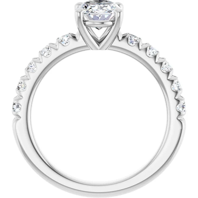 Oval White Gold Four Claw Set Style Engagement Ring