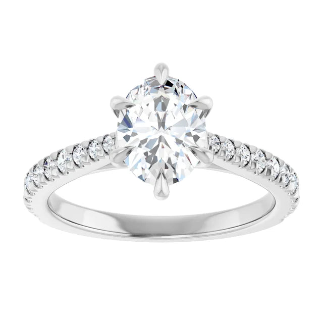 Oval White Gold Claw Set Style Engagement Ring