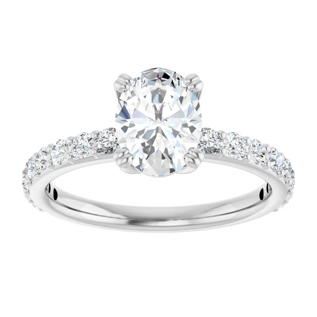 Oval White Gold Claw Set Style Engagement Ring