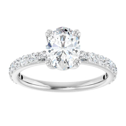 Oval White Gold Claw Set Style Engagement Ring