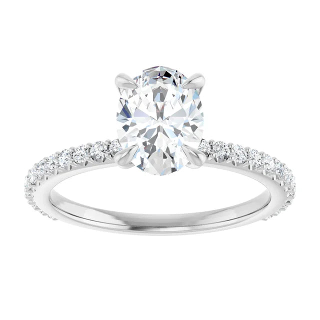 Oval White Gold Claw Set Style Engagement Ring 