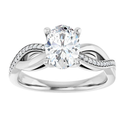 Oval White Gold Claw Set Twist Style Engagement Ring 
