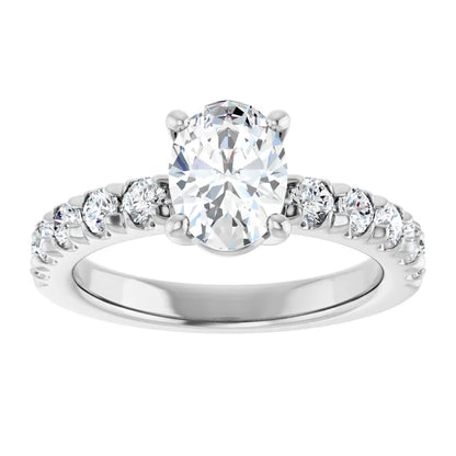 Oval White Gold Four Claw Set Style Engagement Ring