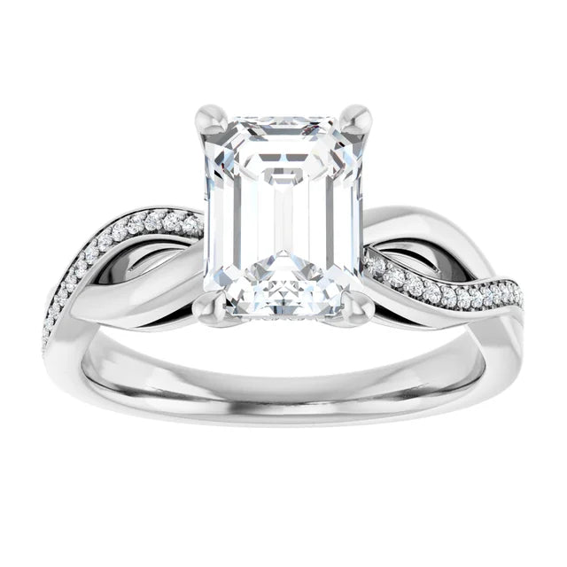 Emerald White Gold Claw Set Twist Style Engagement Ring 