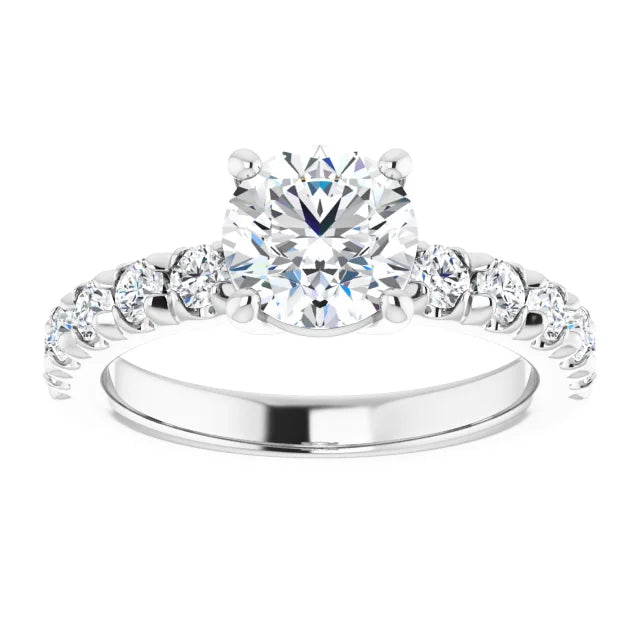 Round Brilliant White Gold Four Claw Set Style Engagement Ring