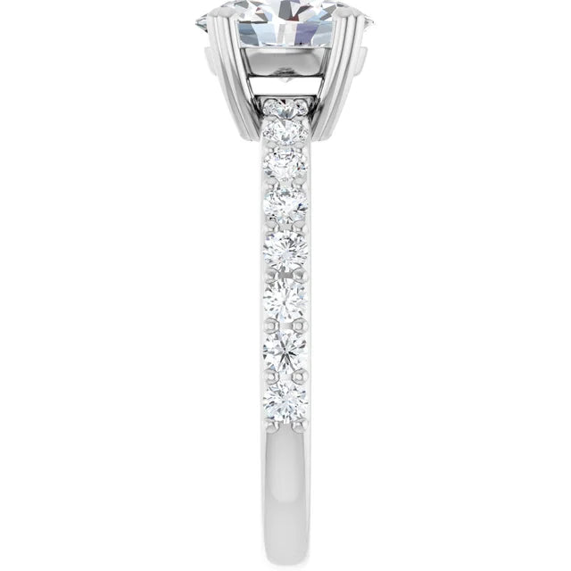 Oval White Gold Claw Set Style Engagement Ring