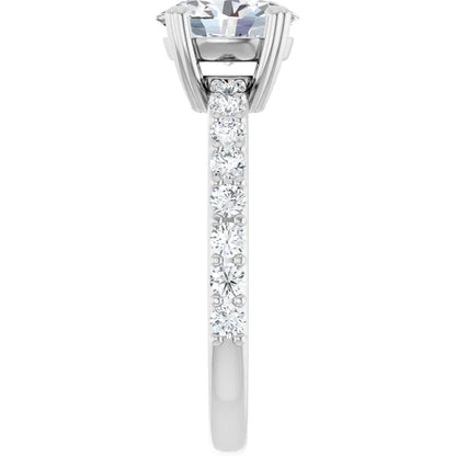 Oval White Gold Claw Set Style Engagement Ring