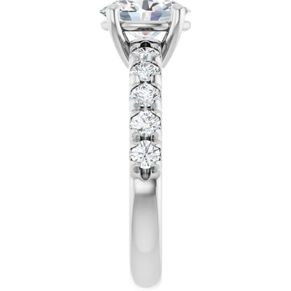 Oval White Gold Four Claw Set Style Engagement Ring