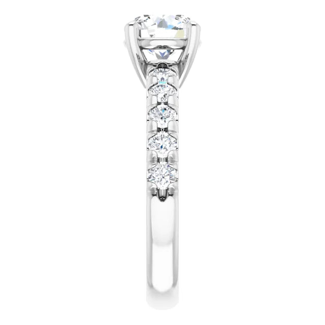 Round Brilliant White Gold Four Claw Set Style Engagement Ring