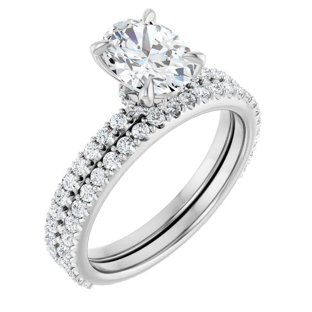 Oval White Gold Claw Set Style Engagement Ring 
