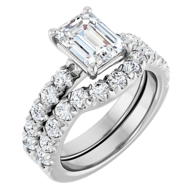 Emerald White Gold Four Claw Set Style Engagement Ring