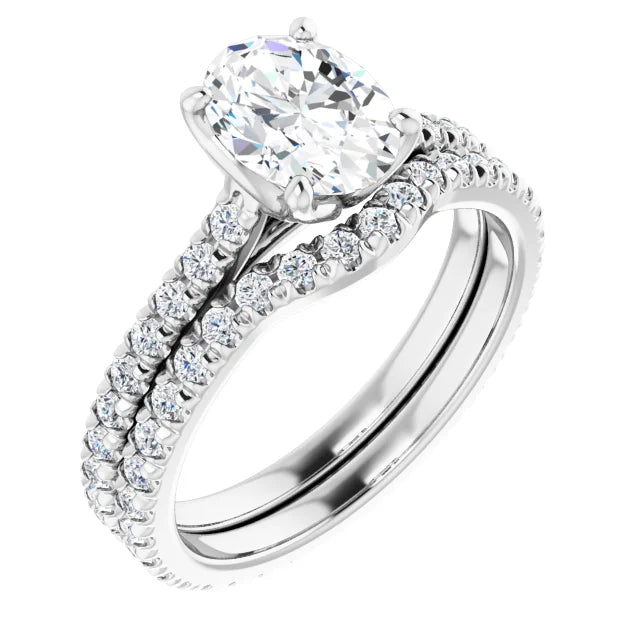 Oval White Gold Claw Set Eternity Style Engagement Ring