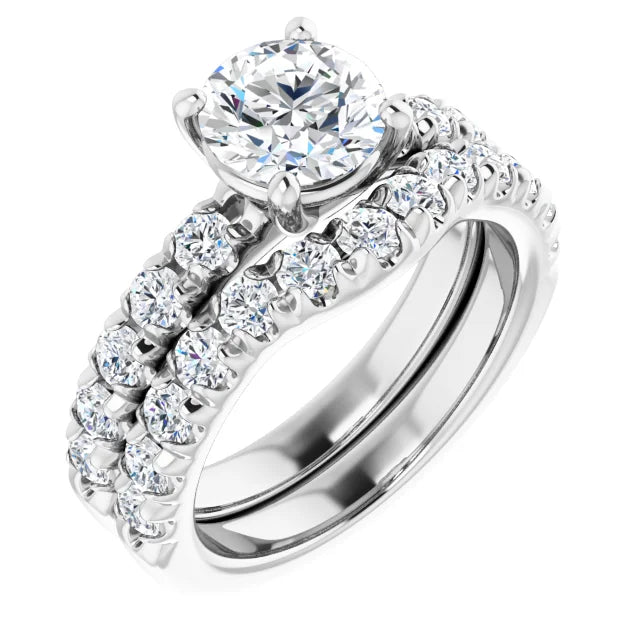 Round Brilliant White Gold Four Claw Set Style Engagement Ring
