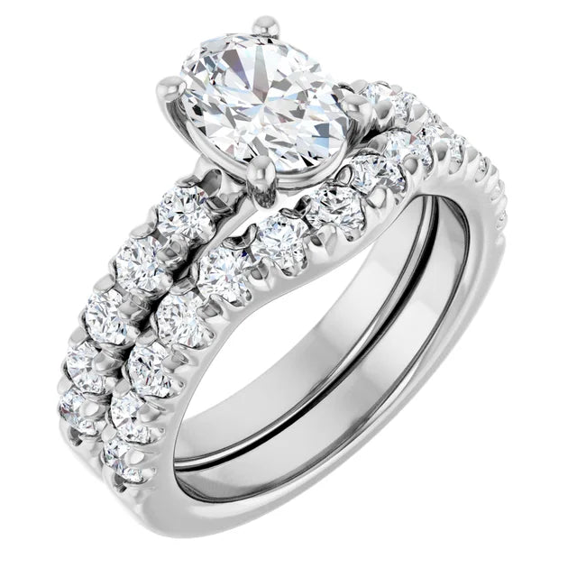 Oval White Gold Four Claw Set Style Engagement Ring