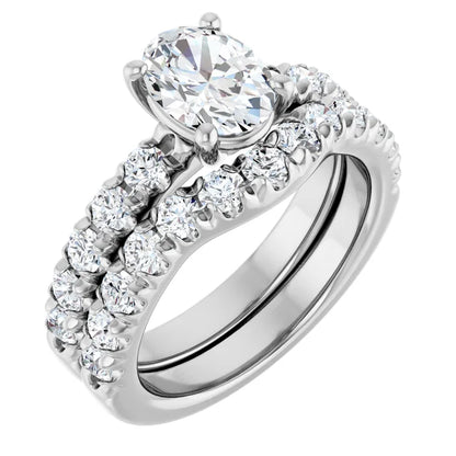 Oval White Gold Four Claw Set Style Engagement Ring