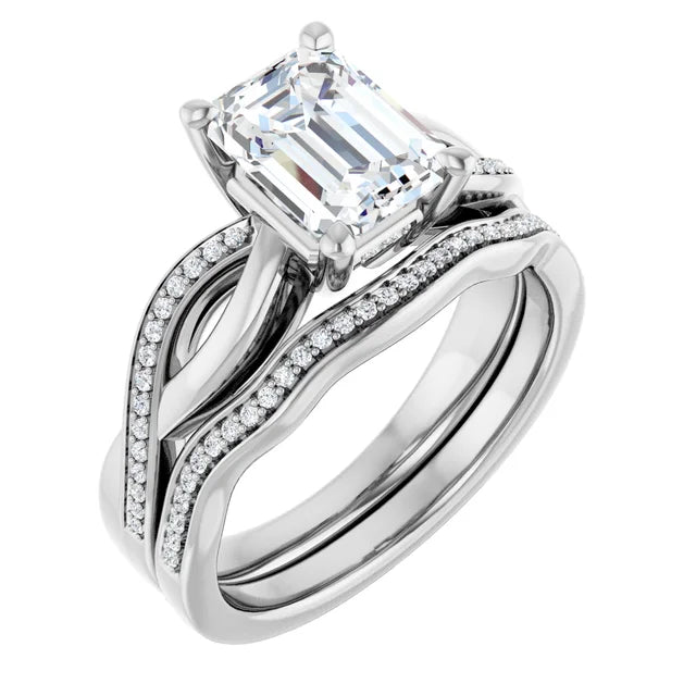 Emerald White Gold Claw Set Twist Style Engagement Ring 