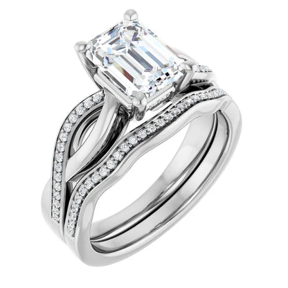 Emerald White Gold Claw Set Twist Style Engagement Ring 