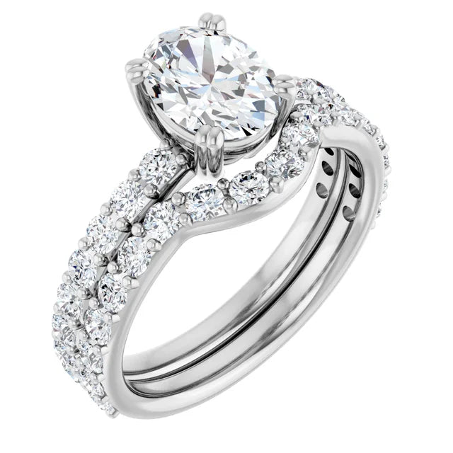 Oval White Gold Claw Set Style Engagement Ring