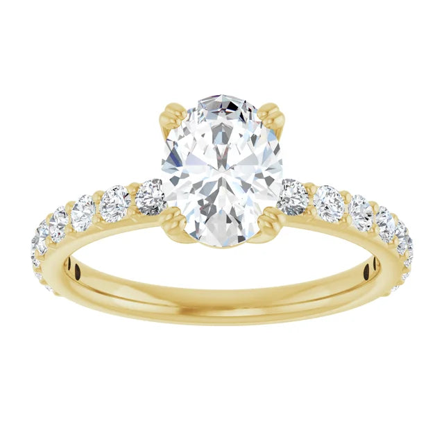 Oval Yellow Gold Claw Set Style Engagement Ring