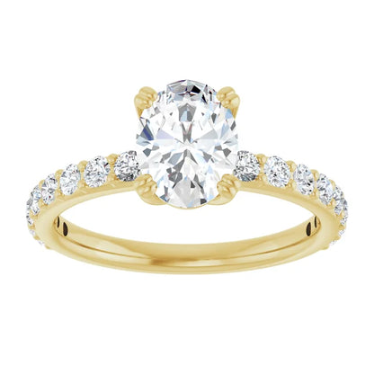 Oval Yellow Gold Claw Set Style Engagement Ring