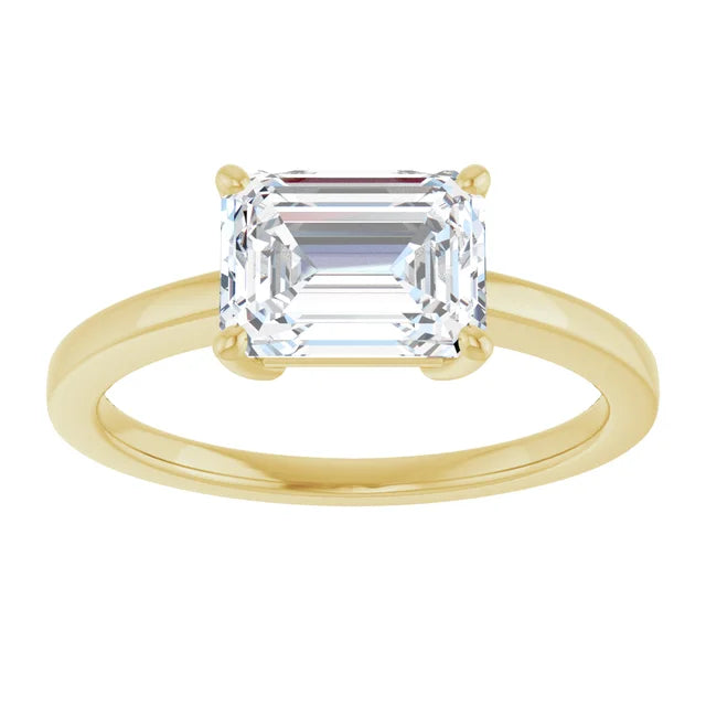 Emerald Yellow Gold East West Solitaire Style Engagement Ring