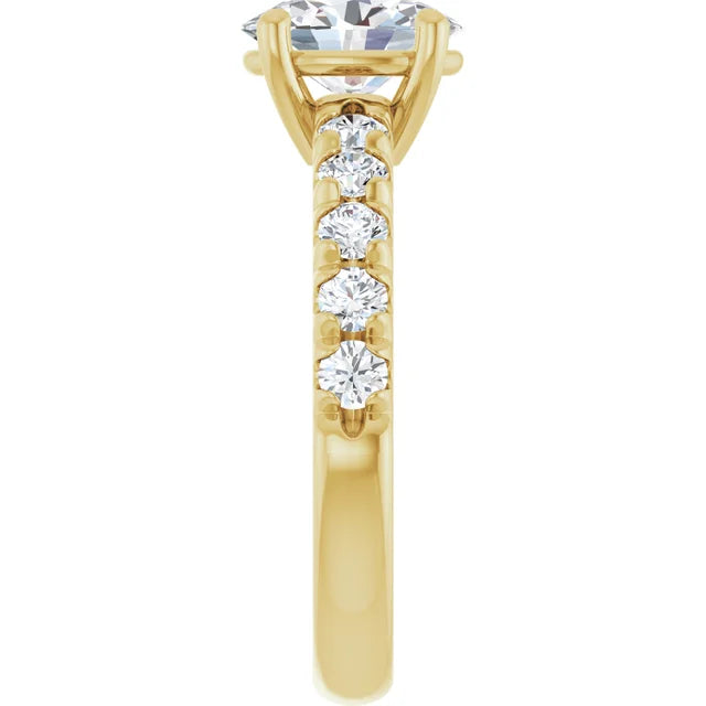 Oval Yellow Gold Four Claw Set Style Engagement Ring