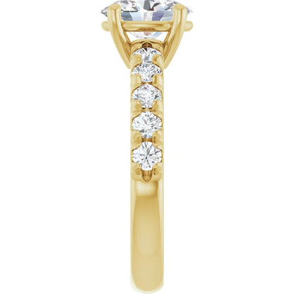 Oval Yellow Gold Four Claw Set Style Engagement Ring