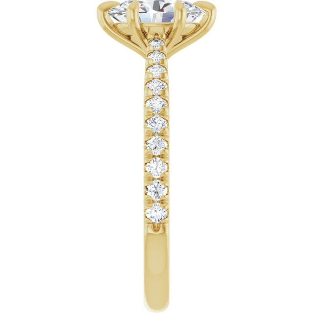 Oval Yellow Gold Claw Set Style Engagement Ring