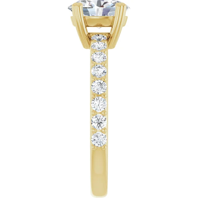 Oval Yellow Gold Claw Set Style Engagement Ring