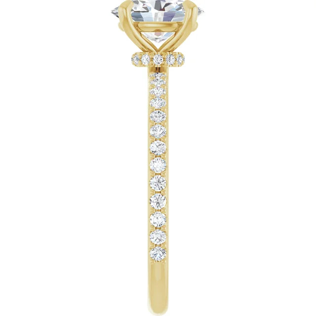 Oval Yellow Gold Claw Set Style Engagement Ring 