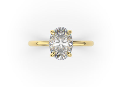 Four Claw Oval Solitaire Engagement Ring