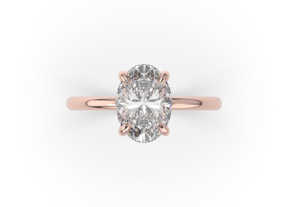 Four Claw Oval Solitaire Engagement Ring