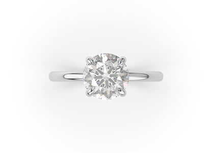 Four Claw Round Brilliant Solitaire Engagement Ring